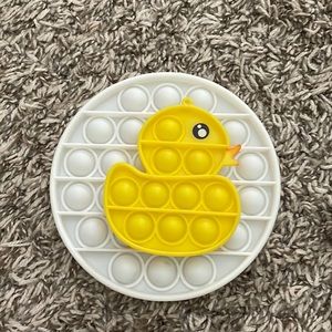 Pack of white pop it and duck pop it